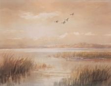 AR Roland Green (1896-1972), Ducks in flight over an estuary, watercolour, signed lower right, 26 x