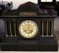 Late 19th century black slate Gothic style clock, the clock face with three turned metal columns