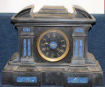 Late 19th century black slate clock, the dial surrounded by two Corinthian columns, 36cm long