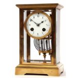 Late 19th century French lacquered brass four-glass mantel clock, the plinth shaped case with