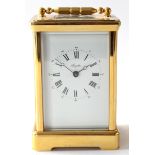 Brass carriage clock, the white Roman enamel dial inscribed Angelus with a Swiss made movement, 13cm