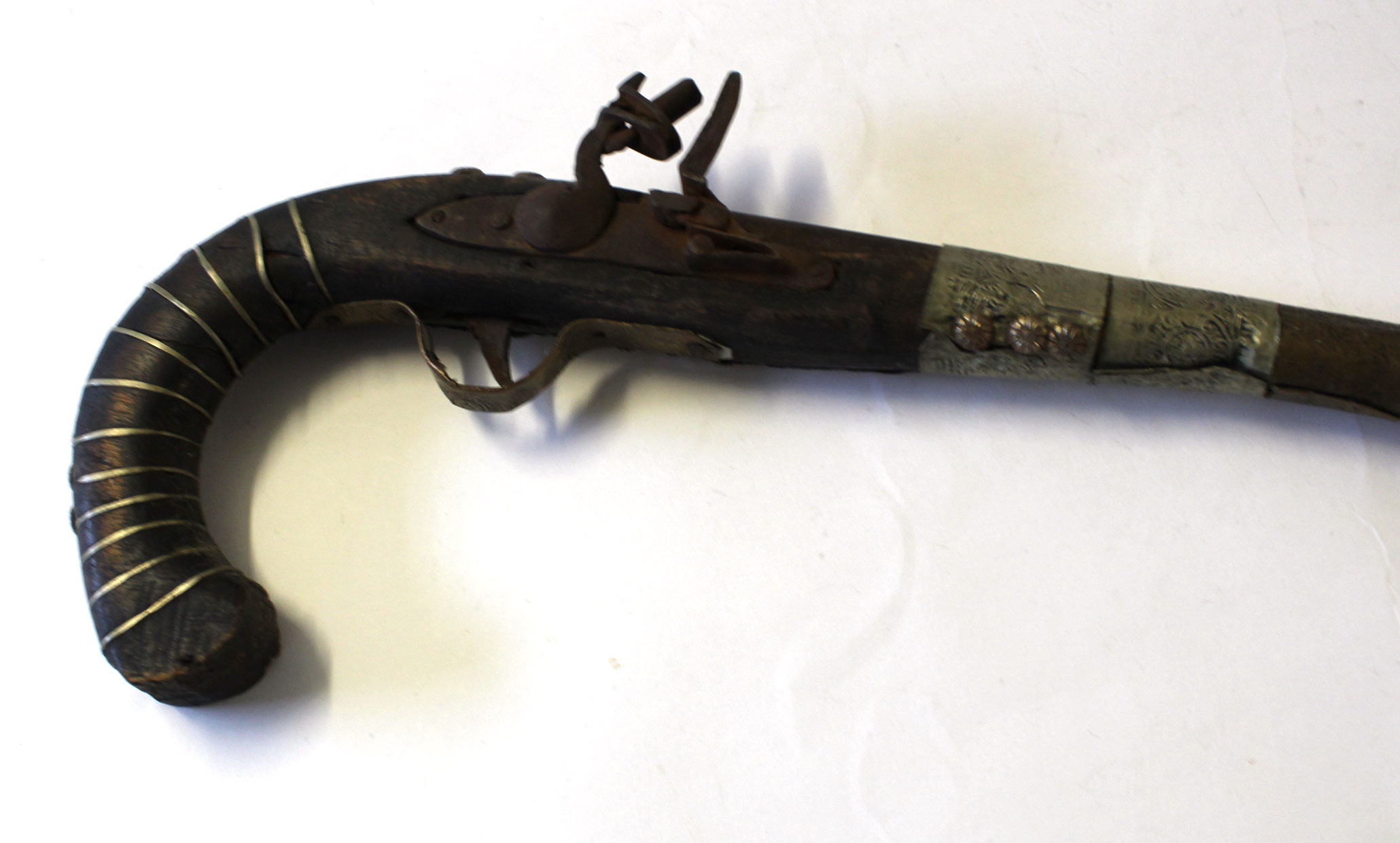 19th century decorative Far Eastern or Indian pistol, the barrel bound with impressed brass, - Image 2 of 4