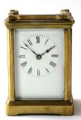 Early 20th century brass carriage clock, the white Roman enamel dial with Swiss movement, 11cm high