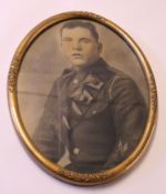 Framed blow-up photograph of a man in military uniform believed to be B Rose of The Norfolk Regiment