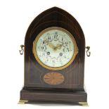 Edwardian mantel clock with inlaid case, the enamel dial decorated with swags of roses, the French