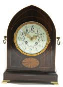 Edwardian mantel clock with inlaid case, the enamel dial decorated with swags of roses, the French