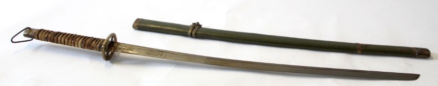 World War II regulation issue Japanese soldier's sword, the sword in green coloured metal scabbard
