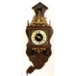 Vienna or Dutch style wall clock with silvered dial with Roman numerals and carved metal figures