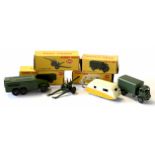 Group of four Dinky military vehicles comprising 5.5 Medium gun Armoured Command vehicle, and Army