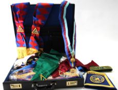 Case containing a good quantity of various Masonic memorabilia and clothing including six aprons,