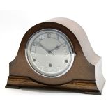Mid-20th century mantel clock in wooden grained case