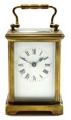 Early 20th century English brass carriage clock, with Roman enamel dial, 11cm high