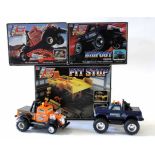 Group of three pit stop supersize truck models