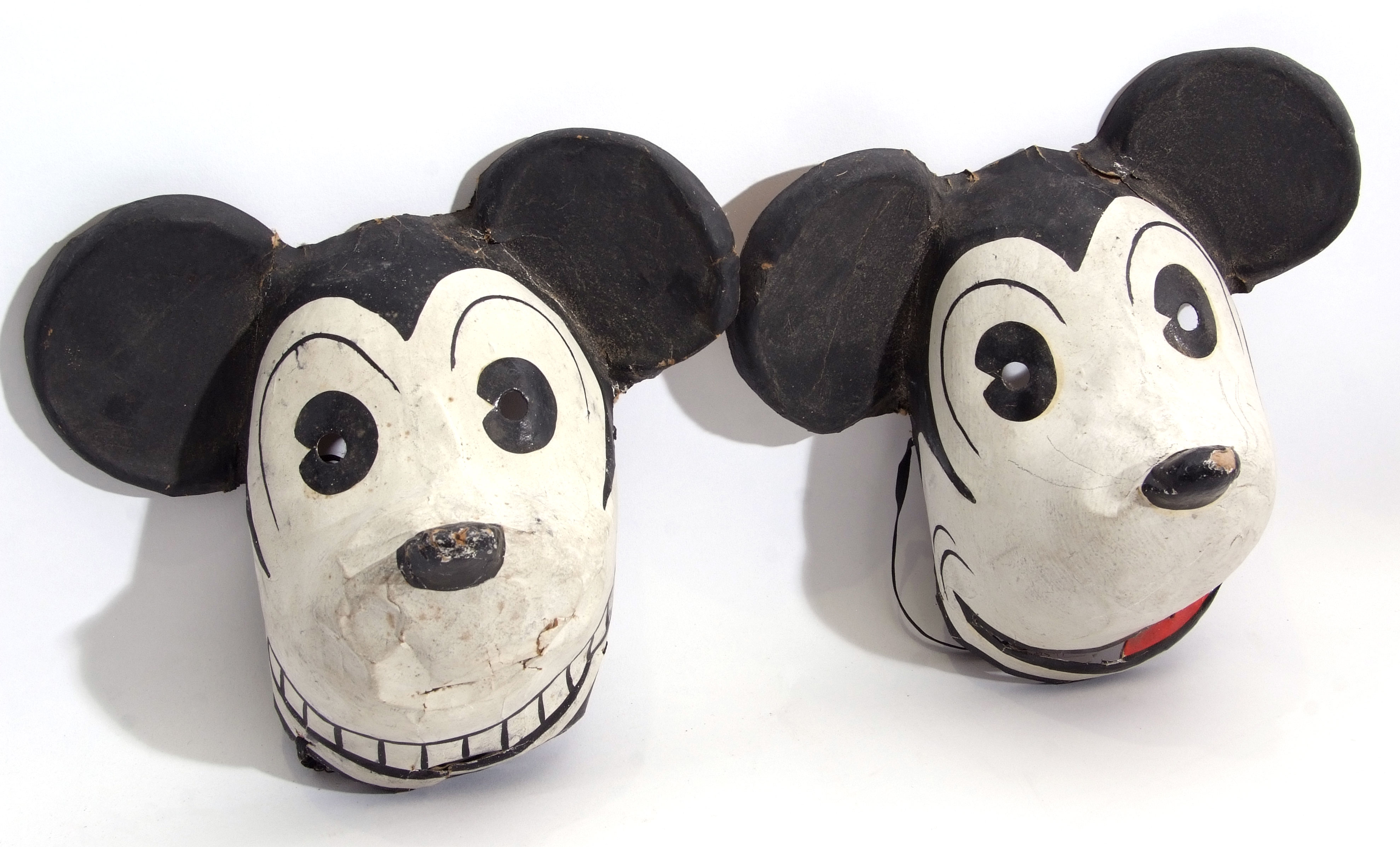 Pair of 1930s Halloween masks modelled as Mickey Mouse, made for the German market circa 1930s