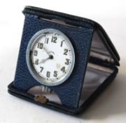 Swiss made 8-day travelling clock in leather case