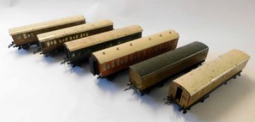 Collection of Meccano Hornby model railway coaches with LNER livery including a guards van and other