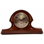 Mid-20th century mahogany and boxwood line inlaid triple barrel mantel clock, the arched and waisted