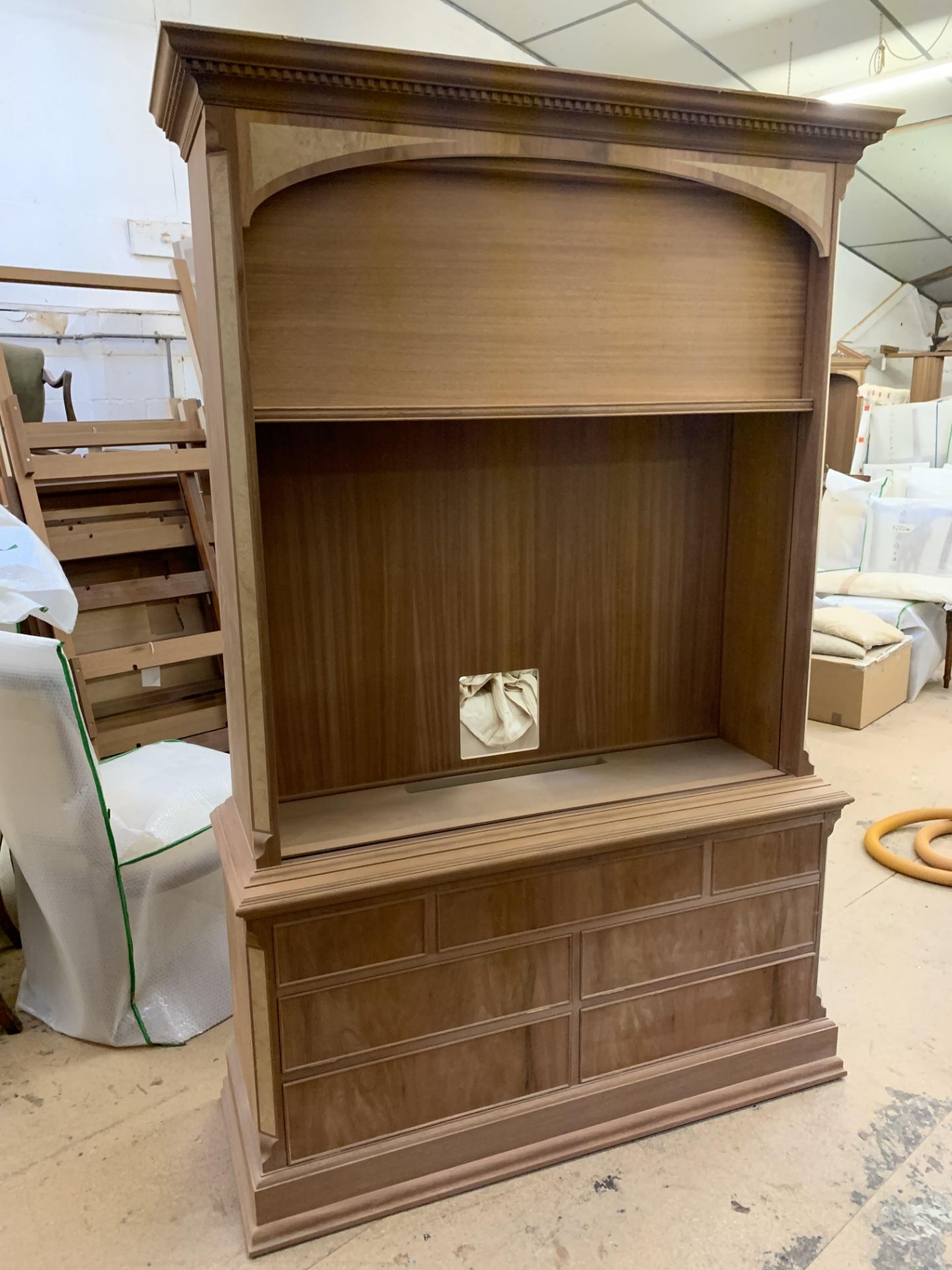 Flatscreen Television Cabinet, disguised as bookcase, in mahogany finish, requires finishing/