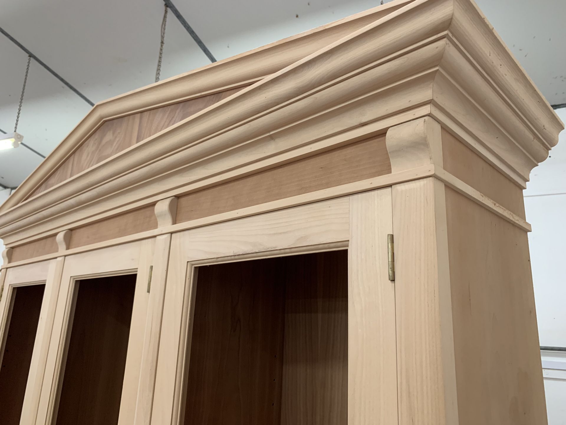 Three door Bookcase, with pediment, from the Trafalgar Cherry range, requires finishing/polishing. - Image 6 of 6