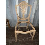 Decoratively carved shield-back Chair (requires finishing/polishing)