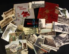 Packet: containing approx 220 postcards predominantly foreign topographical in two old albums,