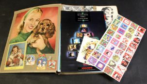 Mid-20th century scrap album with pages containing a number with Christmas themes, with various