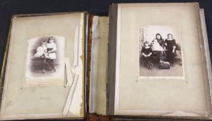 Late 19th century leather bound photograph album containing a quantity of family photographs.