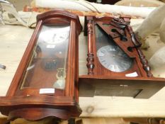 TWO MODERN TEAK WALL CLOCKS, ONE BY LINCOLN AND THE OTHER WITH A QUARTZ MOVEMENT (2)