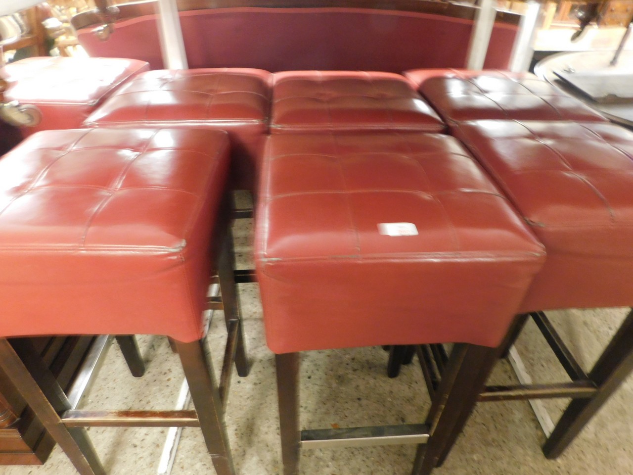SET OF SEVEN RED REXINE SQUARE TOP BAR STOOLS