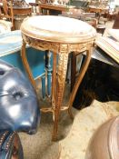 GILT CIRCULAR RESIN TOPPED PLANT STAND WITH AN X SUPPORT