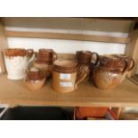 FIVE STONEWARE HARVEST JUGS TOGETHER WITH TWO FURTHER TANKARDS (7)