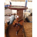 TEAK FRAMED WINE TABLE WITH GREEN LEATHER INSERT ON A TRIPOD BASE
