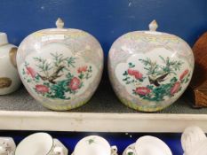 PAIR OF FAMILLE VERT BULBOUS LIDDED VASES WITH TYPICAL PAINTED SCENES