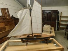 GOOD QUALITY MAHOGANY AND PAINTED POND YACHT ON STAND WITH STITCHED SAILS