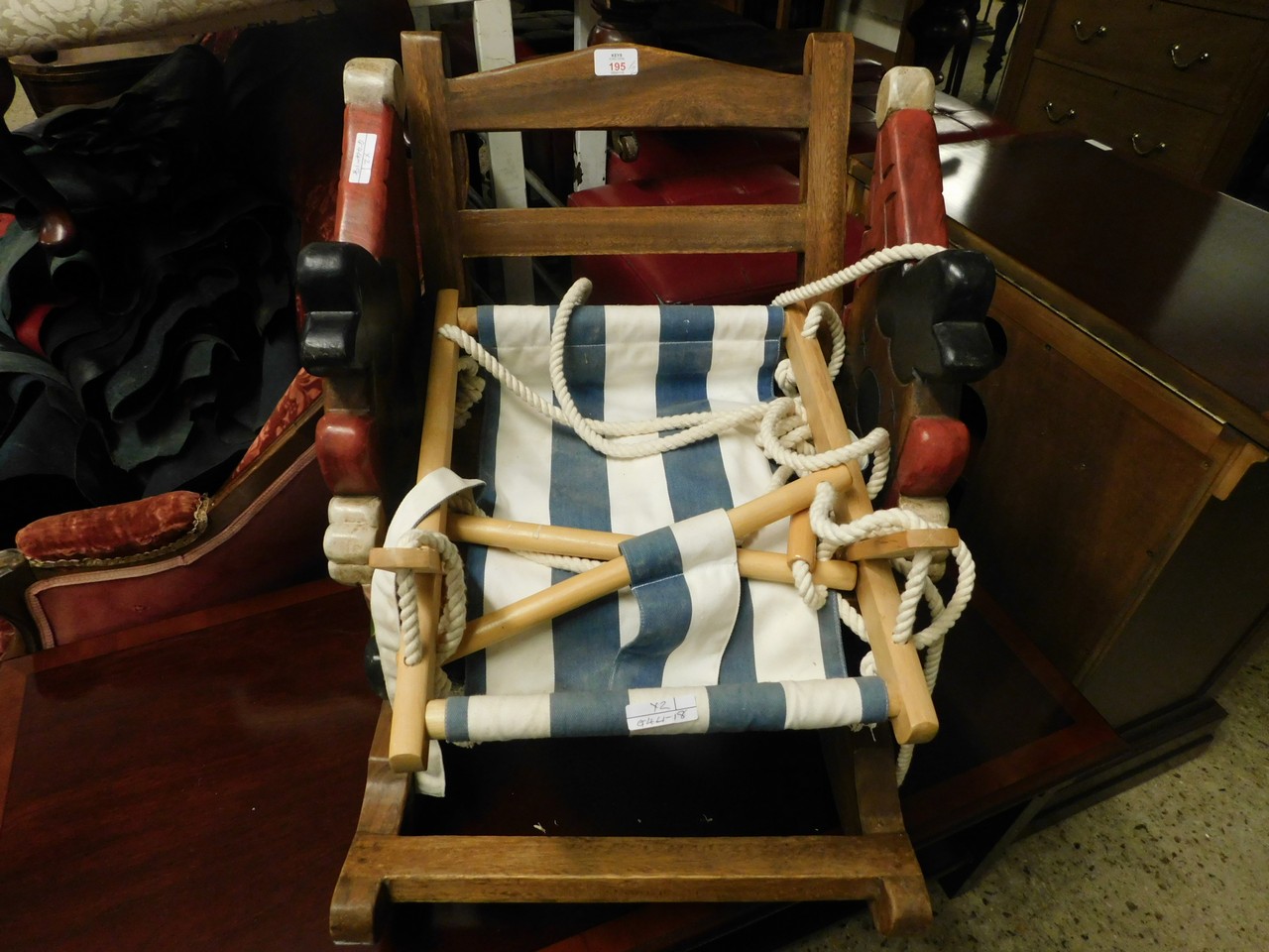 HARDWOOD CHILD'S ROCKING CHAIR WITH CLOWN DETAIL TOGETHER WITH A FURTHER CHILD'S BEECHWOOD FRAMED