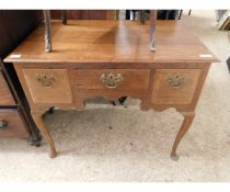 19TH CENTURY OAK LOWBOY WITH THREE DRAWERS RAISED ON PAD FEET