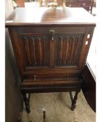 OLD CHARM OAK DRINKS OR MUSIC CABINET WITH DROP DOWN FRONT WITH FULL WIDTH DRAWER ON STAND