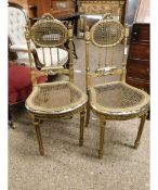 PAIR OF GILDED BEDROOM CHAIRS WITH CANE SEAT AND BACK WITH SPINDLE SUPPORTS WITH RIBBON CARVED