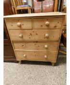 WAXED PINE TWO OVER THREE FULL WIDTH DRAWER CHEST WITH TURNED BUN FEET (SPLITS IN TWO)