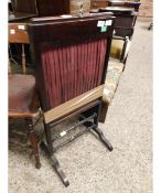 19TH CENTURY ROSEWOOD SCREEN, THE CENTRAL LIFTING FABRIC PANEL RAISED ON SPLAYED FEET, 41CM WIDE