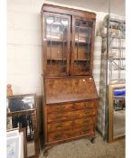 WALNUT QUEEN ANNE STYLE BUREAU BOOKCASE WITH TWO ASTRAGAL GLAZED DOORS WITH DROP FRONT OVER FOUR