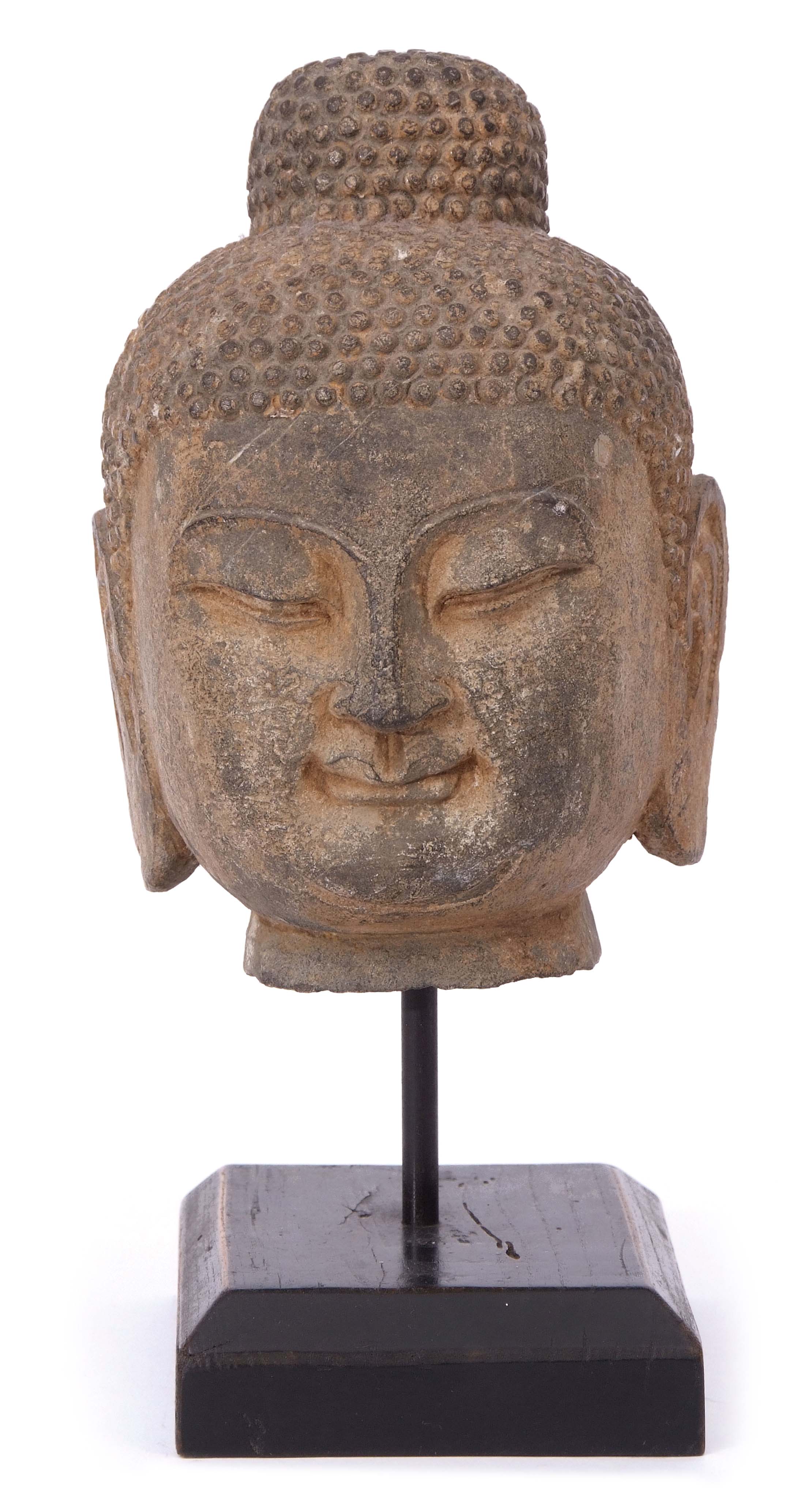 Chinese Tibetan or Thai stoneware model of a Buddha with tightly curled hair and elongated ear lobes