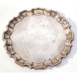 George V small waiter of circular shape with "Chippendale" edge (scratch marks to front and