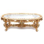 Good quality Louize Quinze style reproduction oval parcel gilded and painted coffee table with