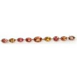 Georgian harlequin gem set elongated brooch, with various graduated coloured gemstones, each in