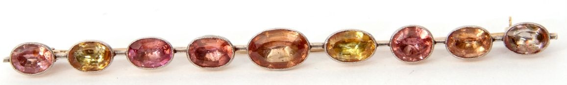 Georgian harlequin gem set elongated brooch, with various graduated coloured gemstones, each in