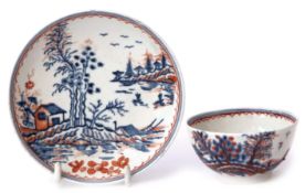 Lowestoft tea bowl and saucer, circa 1780, the blue and white tall trees print decorated with