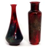 Pair of mid-20th century Royal Doulton flambe vases, the cylindrical body on one with a typical