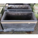 Pair of modern black painted garden planters of rectangular form on stepped bases, 74cm wide