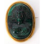 Victorian carved malachite cameo brooch/pendant, depicting a Bacchanite framed in a gilt metal